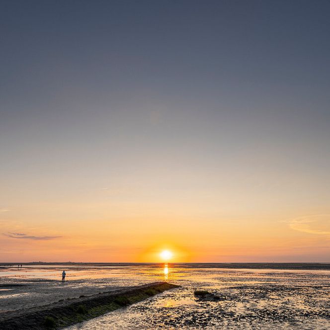 Sonnenuntergang im Watt bei Cuxhaven
